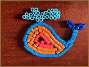 crraft whale created out of plastic beads